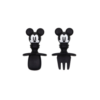 Bumkins Silicone Chewtensils®: Mickey Mouse includes 2 black food-safe silicone utensils with Mickey Mouse-shaped handles.