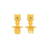 Bumkins Silicone Chewtensils®: Winnie The Pooh features a yellow silicone spoon and fork with bear head-shaped handles with faces.