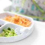 Close-up of a divided plate with broccoli, pasta, and a Bumkins Silicone Chewtensils®: Marble.