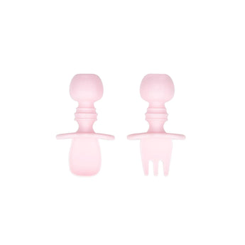 Bumkins Silicone Chewtensils®: Pink—two pink utensils with rounded handles made from 100% food-safe silicone.