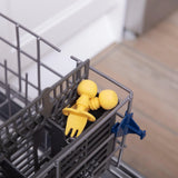 Bumkins Silicone Chewtensils®: Pineapple sits in the utensil compartment of an open dishwasher.
