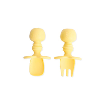 Bumkins Silicone Chewtensils®: Pineapple—two yellow food-safe silicone baby utensils, with easy-grip rounded handles.