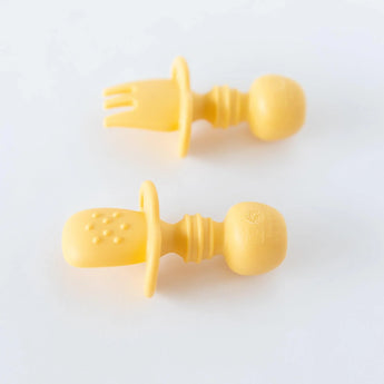 Bumkins Silicone Chewtensils®: Pineapple lay face-down on a white background, showcasing sensory bumps on the back.
