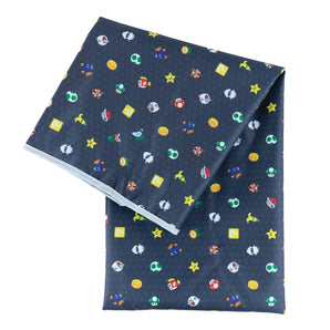Bumkins Splat Mat: Super Mario™ Lineup features colorful video game icons on dark waterproof fabric.