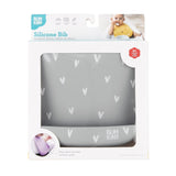 Bumkins Silicone Bib: Hearts is shown in a white packaging box with a clear front window displaying the bib.