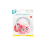 Bumkins Silicone Teething Charms: Pink is shown affixed to a white cardboard packaging card.