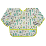 Bumkins Sleeved Bib: Cacti features cactus illustrations on gray waterproof fabric with a green trim and front pocket.