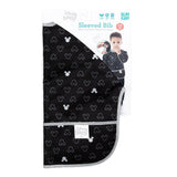 Bumkins Sleeved Bib: Mickey Mouse Icon Black + White is shown folded in its packaging.