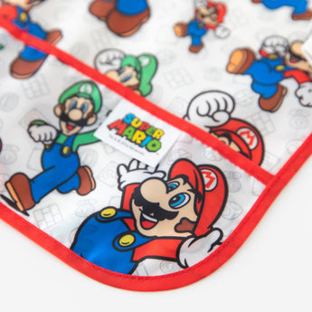 Close-up of Bumkins Sleeved Bib: Super Mario™ Classic on a white background, with focus on the front pocket.