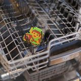Bumkins Silicone Teether: Zelda™ Link sits in the top rack of an open dishwasher.