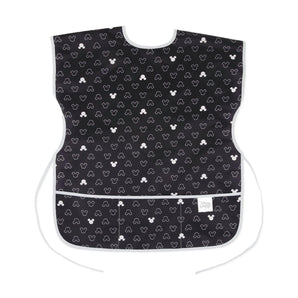 Bumkins Short-Sleeved Smock: Mickey Mouse Icon B+W: waterproof black fabric with white silhouettes, white trim and ties, and 3 pockets.