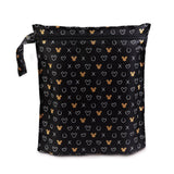 Bumkins Wet Bag: Minnie Mouse Icon Black + White is a black zippered waterproof pouch featuring Minnie Mouse silhouettes and white designs.