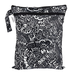 Bumkins Wet/Dry Bag: Be Kind features a white doodle print on black waterproof fabric with two zippered compartments.