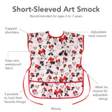 Infographic of Bumkins Short-Sleeved Art Smock: recommended for ages 3-7 years, adjustable neck and waist closure, easy-care waterproof fabric.