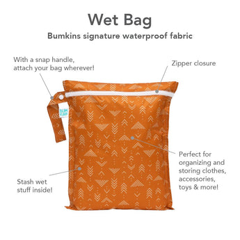 Infographic of Bumkins Wet Bag: Bumkins signature waterproof fabric, zipper closure, snap handle, perfect for organizing and storing.