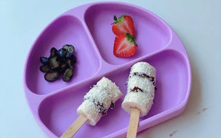 🍌 Quick & Fun Snack Ideas: Frozen Banana Bites Dipped in "Nutella" - Bumkins