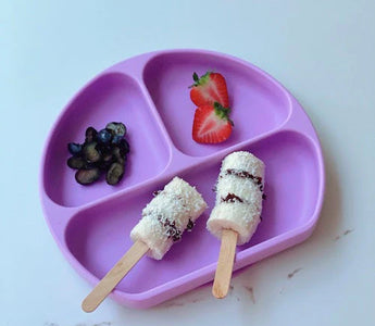 🍌 Quick & Fun Snack Ideas: Frozen Banana Bites Dipped in "Nutella" - Bumkins
