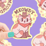 Turtle Soups Meowdy vinyl sticker: Cowboy Cat in a hat & boots with MEOWDY text on purple, scratch-resistant.