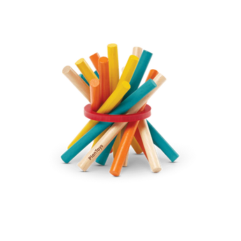 A cluster of colorful Pick Up Sticks by PlanToys, made sustainably, bundled with a red ring.