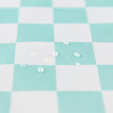 Close-up of water droplets on a Bumkins Wet Bag Plus 2 Pack: Mint + Charcoal Check.