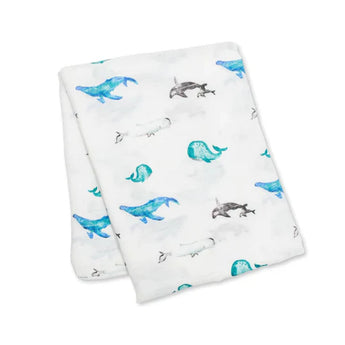 Lulujo Inc. Bamboo Swaddle: White blanket with blue and gray whale illustrations.