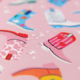 Close-up of water droplets on a Bumkins Sleeved Bib 2 Pack: Disco Boots.