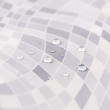 Close-up of water droplets on Roamio by Bumkins Wet/Dry Clutch: Disco Check.