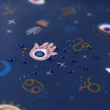 Close-up of water droplets on Bumkins Wet/Dry Bag: Evil Eye.