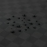Close-up of water droplets on Roamio by Bumkins Wet Bag: Rich Black.