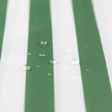 Close-up of water droplets on a Bumkins Wet Bag Plus 2 Pack: Green + Gray Stripe.