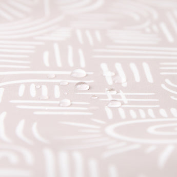 Close-up of water droplets on Bumkins Short-Sleeved Smock: Wander.