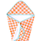 The Hooded Towel, Mickey Mouse Check by copp is an orange and white checkered towel with blue Mickey Mouse silhouettes and trim.