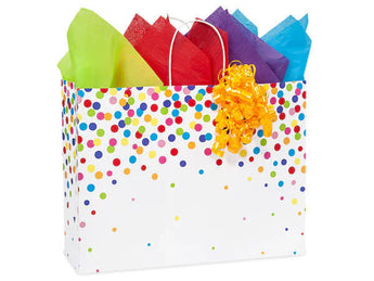 The Zoolikins gift wrapping is a white bag with colorful dots, vibrant tissue paper, and a yellow curly ribbon. Perfect for any occasion!.