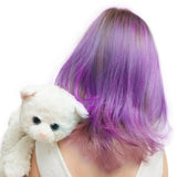 With vibrant purple hair from Piggy Paints Kid Safe Hair Color & Conditioner and a plush white cat, they exude kid-friendly charm.