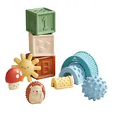 Itzy Ritzys Itzy Blocks feature colorful baby toys like a mushroom, sun, and hedgehog with sensory textures and squishy-soft blocks.