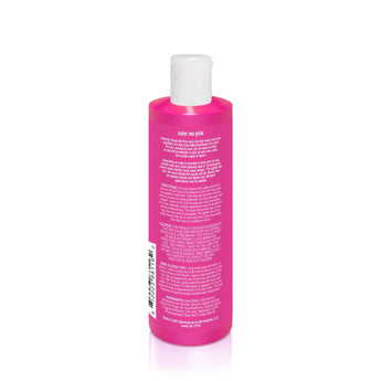 Bright pink Kid Safe Hair Color & Conditioner by Piggy Paint, white cap, kid-friendly, label includes instructions in small white text.