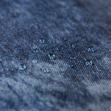 Close-up of water droplets on a Roamio by Bumkins Wet Bag 2 Pack: Denim On Denim.