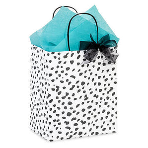 Zoolikins Gift Wrapping: White bag with black spots, turquoise tissue paper, and black bow—ideal for greeting card gifts.