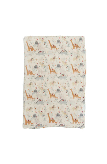 The LouLou Lollipop Muslin Swaddle, Baby Dinomite features giraffes, birds, and flowers on a light bamboo muslin fabric.