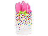 Gift wrapping by Zoolikins | Childrens Boutique features multicolored dots, a green bow, and pink tissue paper—ideal for cheerful cards.