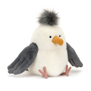Check out the Jellycat, Chip Seagull: a plush beach bird with gray wings, an orange beak, fluffy crest, and pink feet sitting upright.