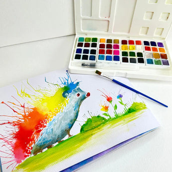 A vibrant watercolor painting of a colorful hedgehog with a Portable Watercolor Set by Life of Colour, nestled in green grass.