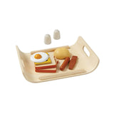 Breakfast Menu: tan wood tray with wood bread slices, egg, sausage, and salt & pepper shakers.