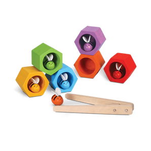 PlanToys Beehives features colorful hexagonal blocks, bees, and tweezers to boost fine motor skills and color recognition.