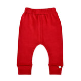 Finn and Emmas Organic Cotton Pants in Scarlet Red feature an elastic waistband and cuffed ankles, shown on a white background.