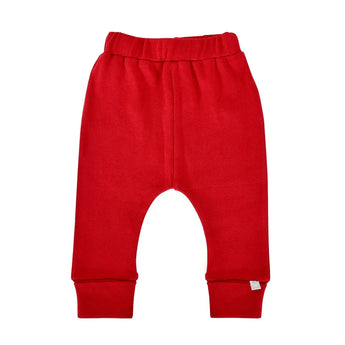 Finn and Emmas Organic Cotton Pants in Scarlet Red feature an elastic waistband and cuffed ankles, shown on a white background.