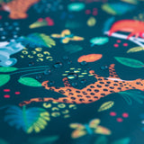 Close-up of water droplets on a Bumkins Wet Bag 2 Pack: Jungle + Animal Prints.
