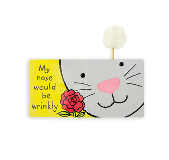 Illustration of smiling white bunny, like a Jellycat plush, with pink nose, holding red rose and fluffy tail. Text: My nose would be wrinkly.