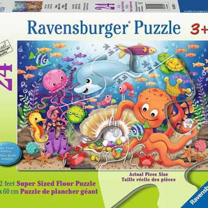 24 Piece Floor Puzzle, Fishie's Fortune: green box with ocean illustrations; text "24 Ravensburger Puzzle 3+ 3x2 feet Super Sized Floor Puzzle."
