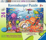 24 Piece Floor Puzzle, Fishie's Fortune: green box with ocean illustrations; text "24 Ravensburger Puzzle 3+ 3x2 feet Super Sized Floor Puzzle."